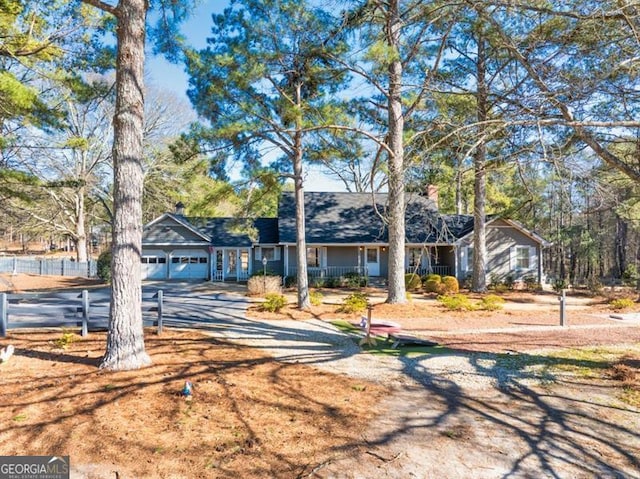 single story home with a garage