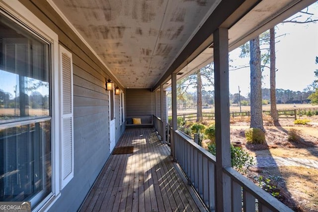 balcony featuring a rural view