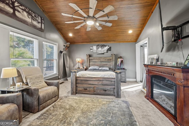 bedroom featuring wood ceiling, ceiling fan, lofted ceiling, and light carpet