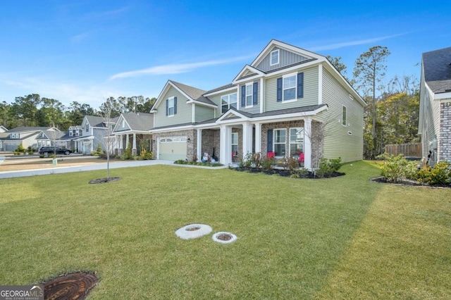 craftsman-style home featuring a front yard and covered porch