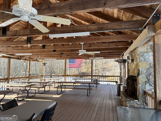 wooden deck featuring ceiling fan