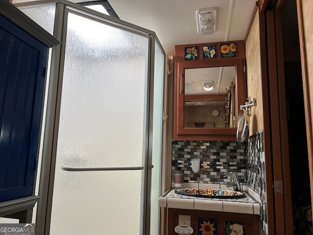 kitchen with backsplash and tile countertops