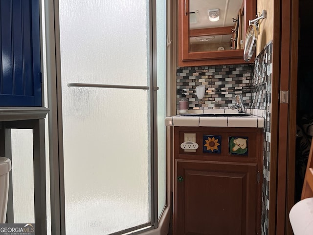 kitchen featuring tasteful backsplash