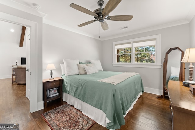 bedroom featuring dark wood-type flooring, ceiling fan, and crown molding