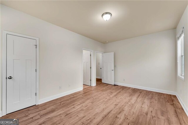 walk in closet featuring carpet and vaulted ceiling