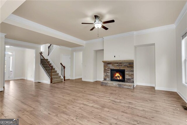 unfurnished dining area featuring a wealth of natural light, crown molding, dark hardwood / wood-style flooring, and a notable chandelier