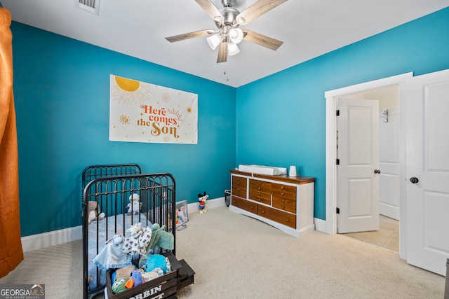 189 Bear Cub Way, Bogart, GA 30622 - carpeted bedroom with a crib and ceiling fan