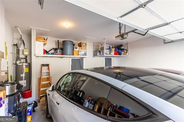 garage with water heater and a garage door opener