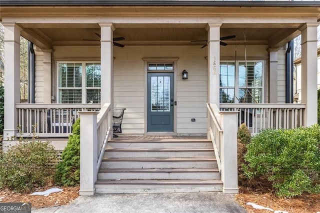 doorway to property featuring covered porch