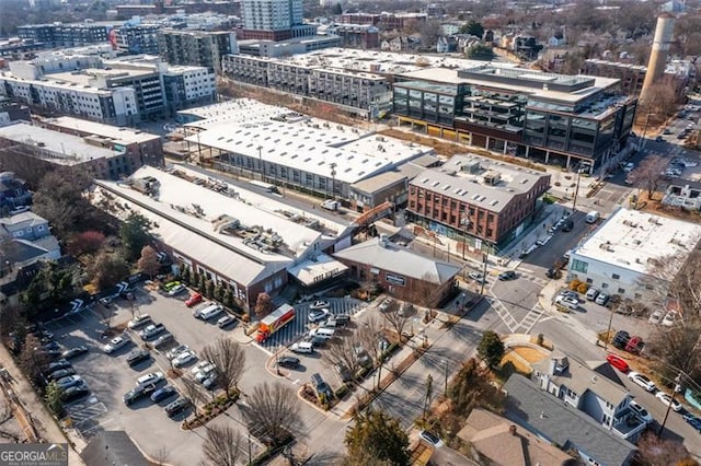 birds eye view of property with a city view