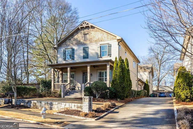 view of front of home featuring covered porch and driveway