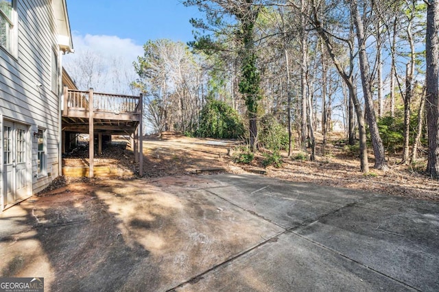 view of yard with a wooden deck