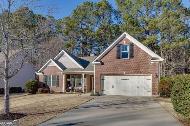 view of front of house with a front lawn and a garage