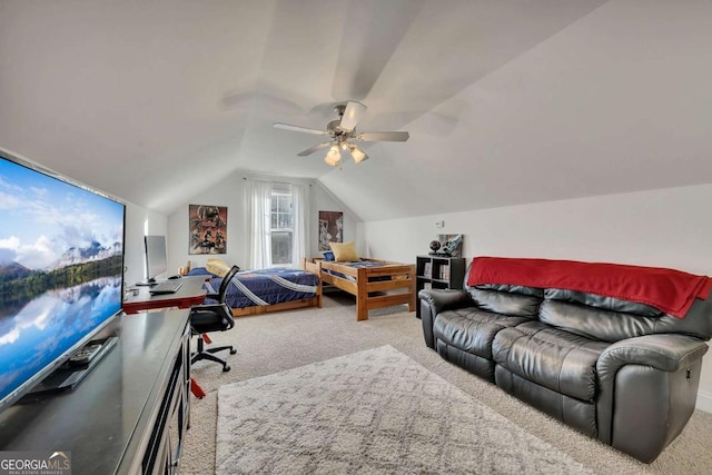 bedroom with ceiling fan, light carpet, and lofted ceiling