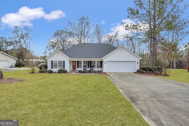 ranch-style home featuring a front lawn, covered porch, and a garage