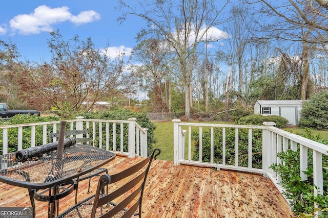 wooden terrace with a storage shed