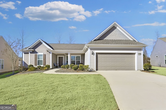 ranch-style house featuring a front lawn and a garage