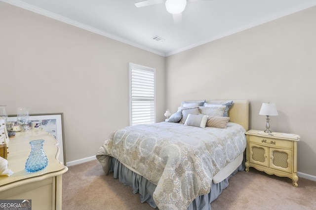 carpeted bedroom with ornamental molding, visible vents, baseboards, and a ceiling fan