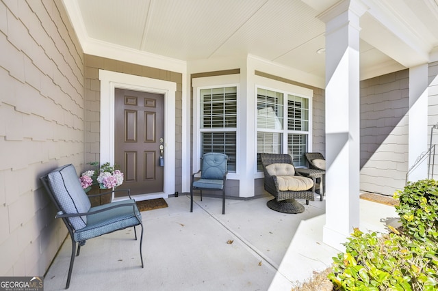 property entrance with covered porch