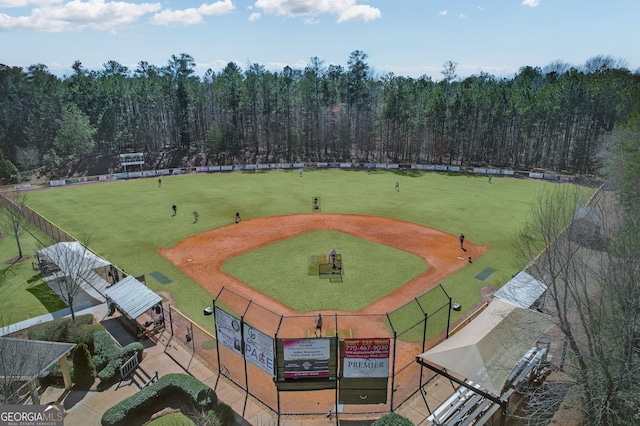 aerial view featuring a wooded view