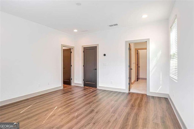 unfurnished bedroom with light hardwood / wood-style floors