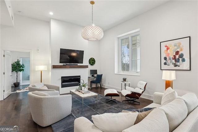 living room featuring dark hardwood / wood-style flooring