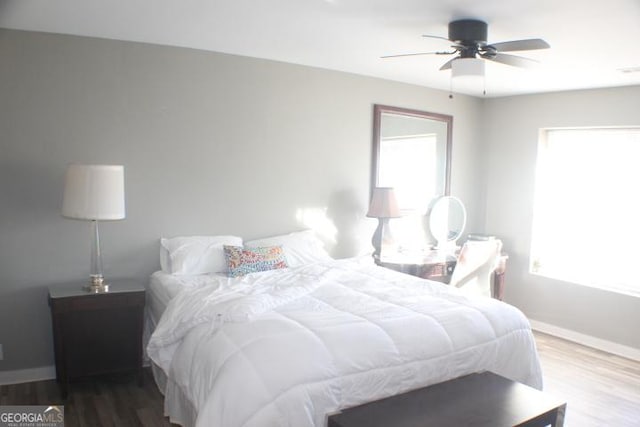 bedroom featuring ceiling fan and hardwood / wood-style floors