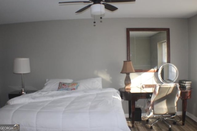 bedroom featuring ceiling fan and hardwood / wood-style floors