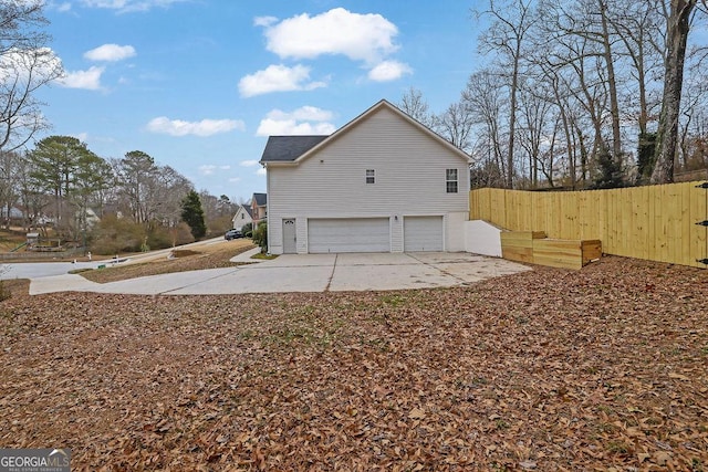 view of home's exterior with a garage