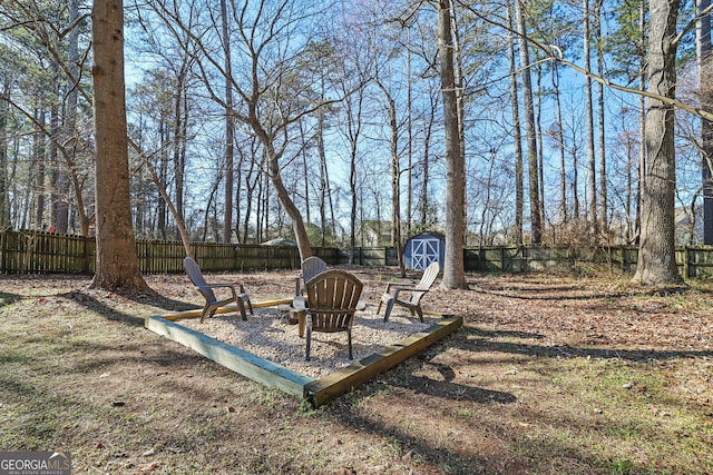 view of yard with a storage shed