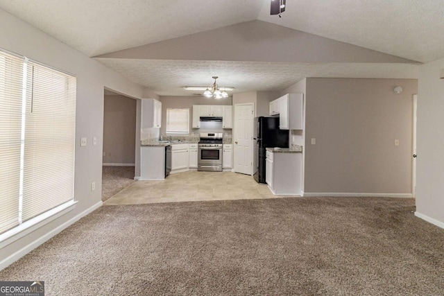 kitchen with light carpet, white cabinetry, a textured ceiling, black appliances, and sink