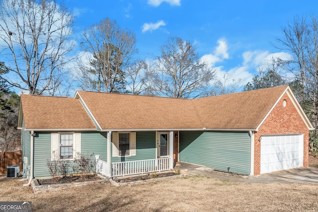 ranch-style house with central AC, covered porch, and a garage