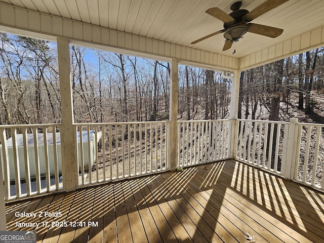 wooden deck with ceiling fan