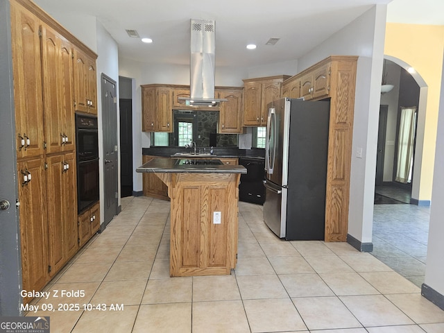 unfurnished living room with ceiling fan, dark wood-style flooring, and baseboards