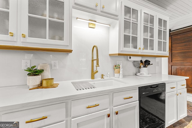 kitchen with sink, black dishwasher, and white cabinetry