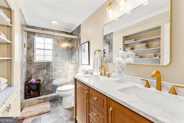 bathroom with toilet, crown molding, a shower with door, and vanity