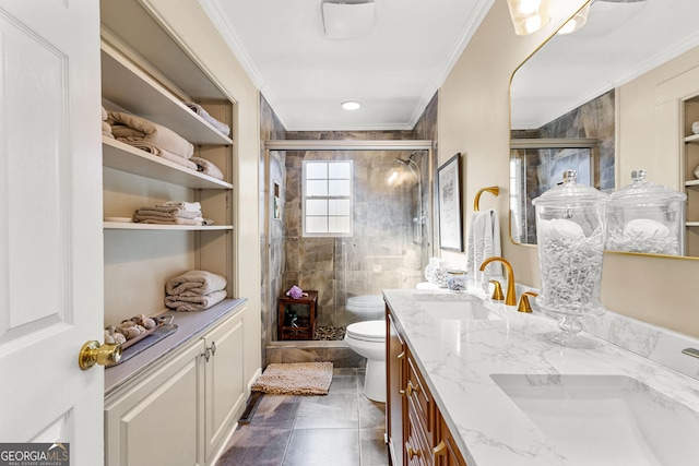 bathroom featuring toilet, vanity, walk in shower, tile patterned floors, and ornamental molding