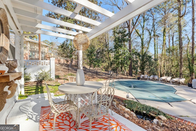 view of pool with a pergola and a patio area