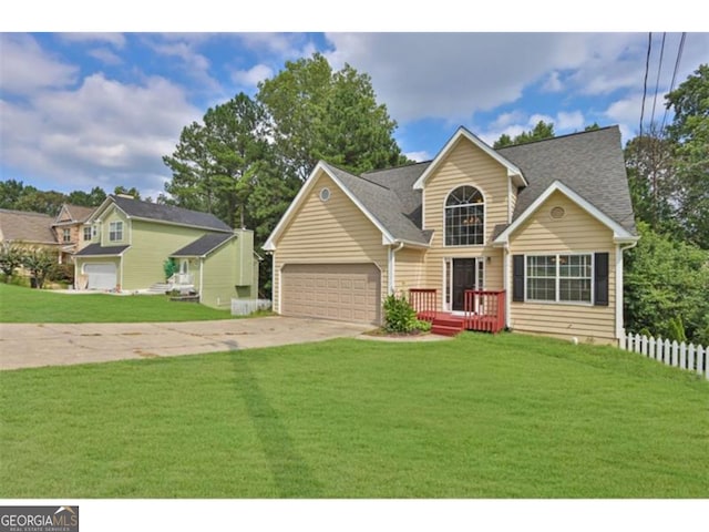 view of front facade featuring a garage and a front yard