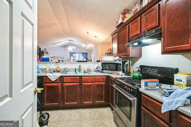 kitchen with lofted ceiling, pendant lighting, appliances with stainless steel finishes, a textured ceiling, and ceiling fan with notable chandelier