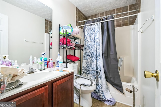 full bathroom with a textured ceiling, tile patterned floors, vanity, toilet, and shower / tub combo with curtain