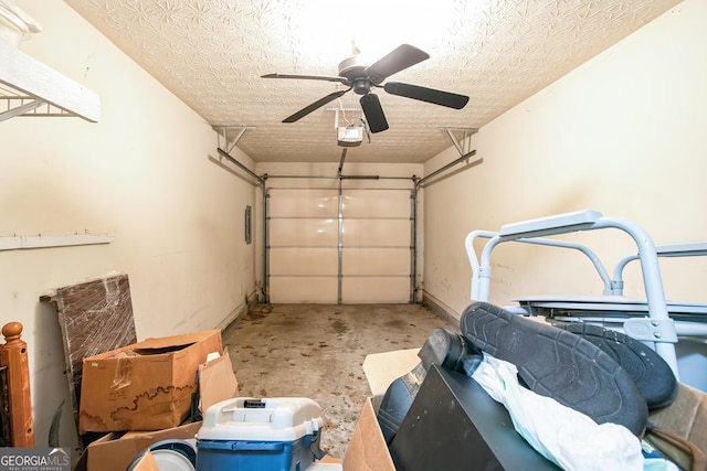 garage with ceiling fan and a garage door opener