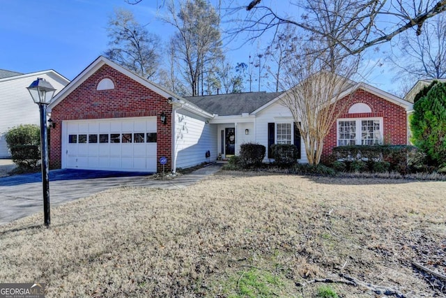 view of front facade with a front lawn and a garage