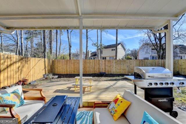 view of patio / terrace featuring a deck and grilling area