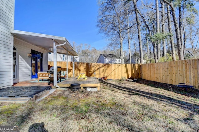 view of yard featuring a wooden deck