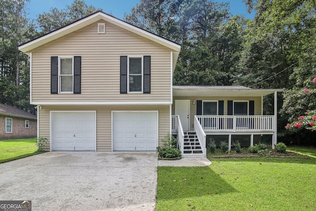 split level home featuring a garage, a front yard, and covered porch