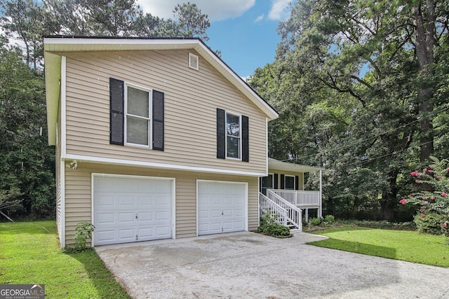 view of front of house featuring a garage, a porch, and a front yard