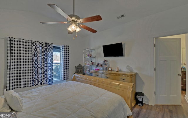 bedroom featuring ceiling fan and hardwood / wood-style floors