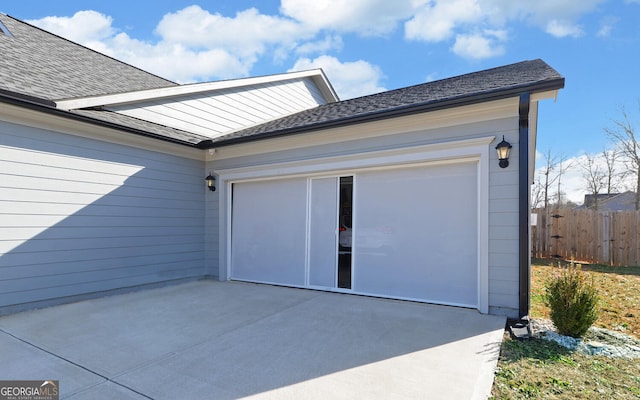 exterior space featuring a patio area and a garage