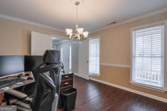 home office featuring dark hardwood / wood-style flooring, ornamental molding, and an inviting chandelier